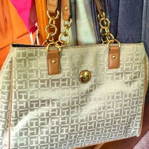 Kahki and tan carryall roomy with zippers